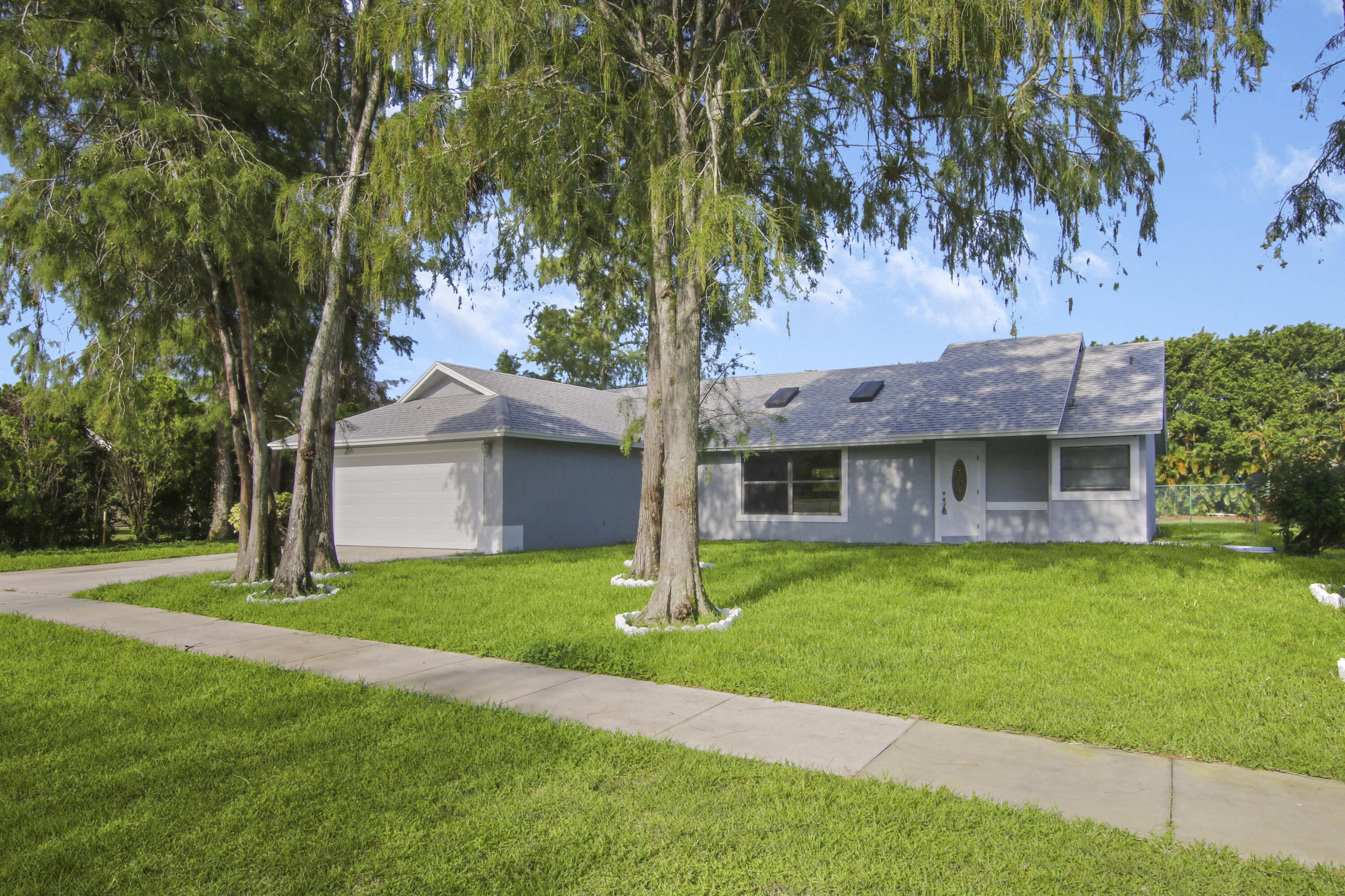 1252 Raintree Lane Wellington, FL 33414 - Photo 1 of 22 Welcome to Wellington