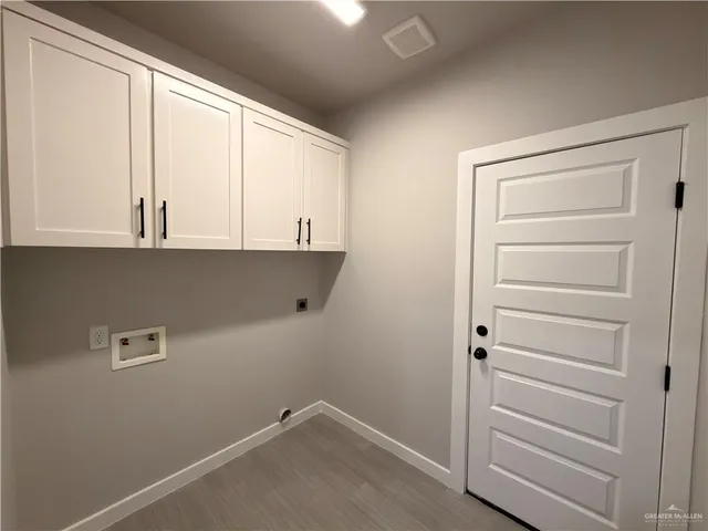 a view of cabinets and closet