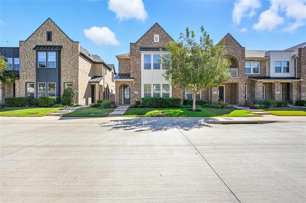 4836 Paddock Trail Carrollton, TX 75010 - Photo 2 of 25 a view of multiple houses with yard and green space