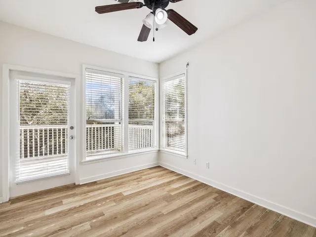 a view of a livingroom with a ceiling fan