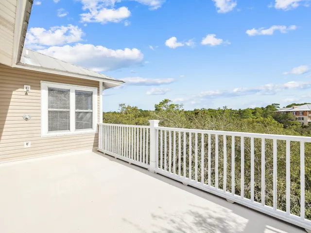 a aerial view of a house with a yard
