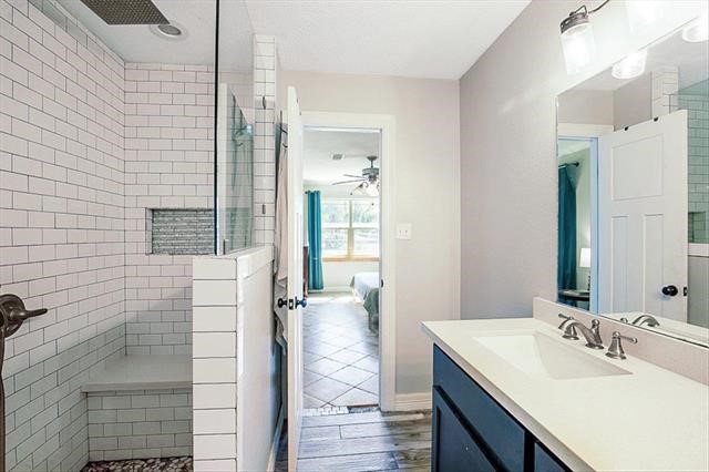 545 Elm Street Sour Lake, TX 77659 - Photo 8 of 15 a bathroom with a sink and a mirror