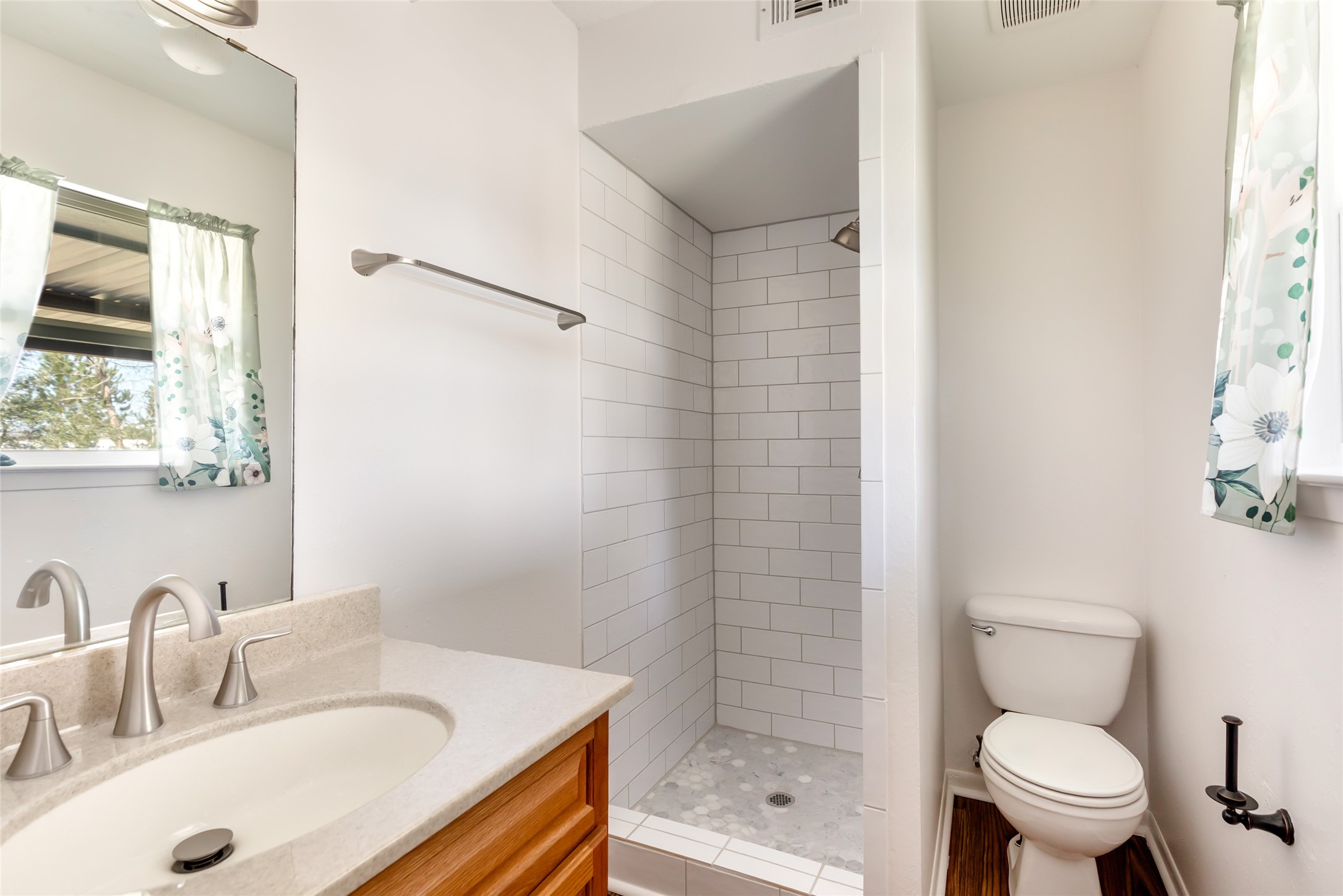 4019 Hillcrest Street Liberty, TX 77575 - Photo 11 of 31 a bathroom with a sink toilet and shower