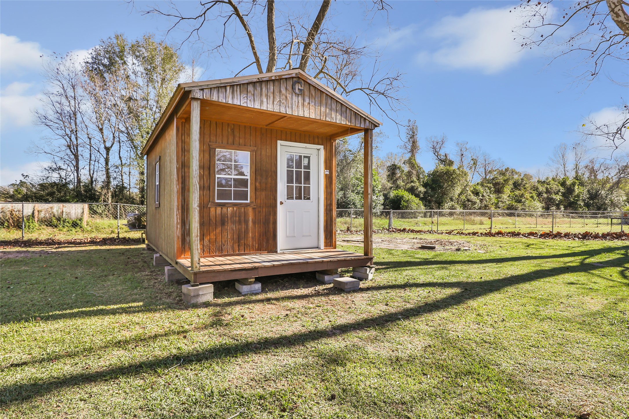 4019 Hillcrest Street Liberty, TX 77575 - Photo 21 of 31 a front view of a house with a yard