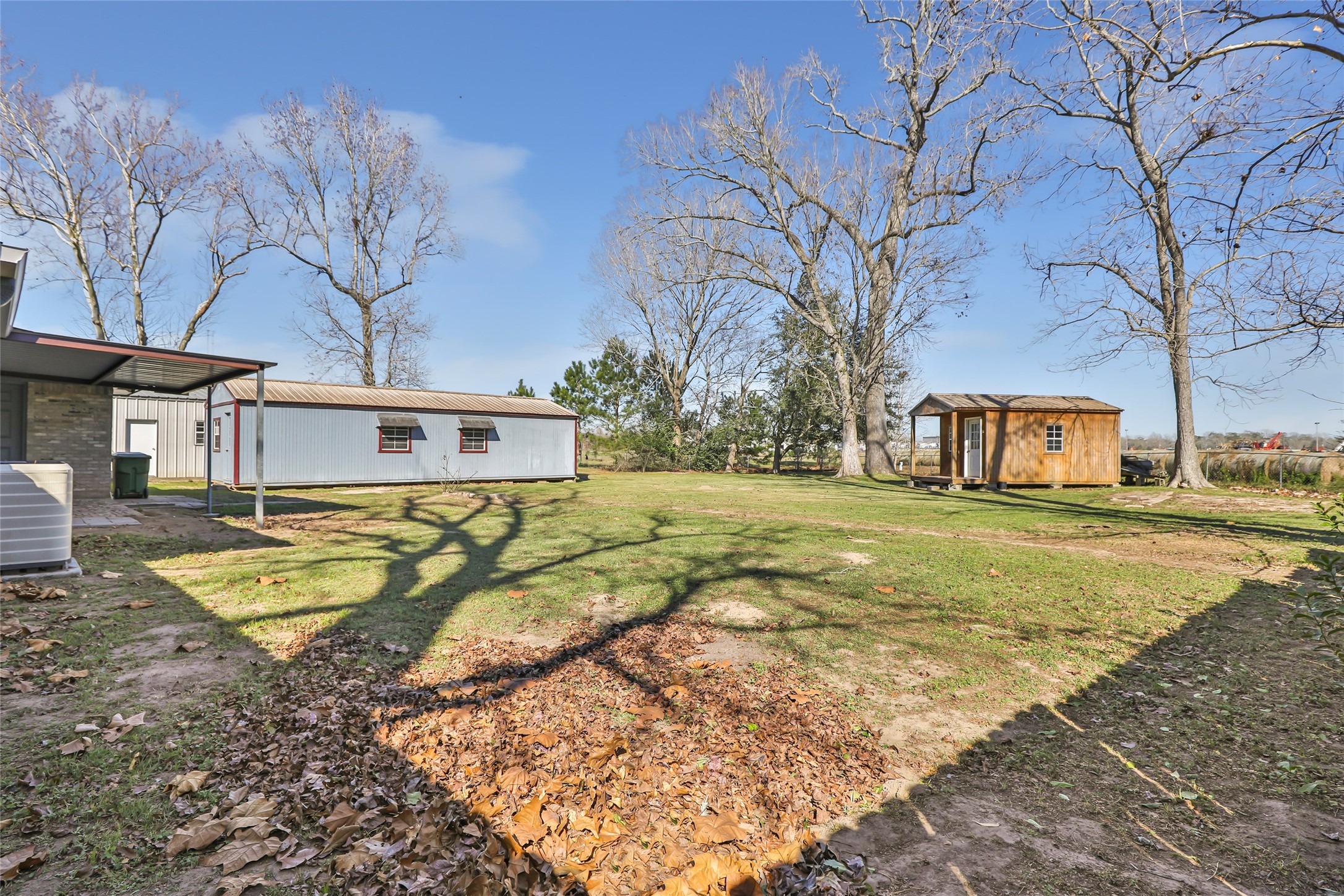 4019 Hillcrest Street Liberty, TX 77575 - Photo 24 of 31 a view of a house with a yard covered with snow in front of house