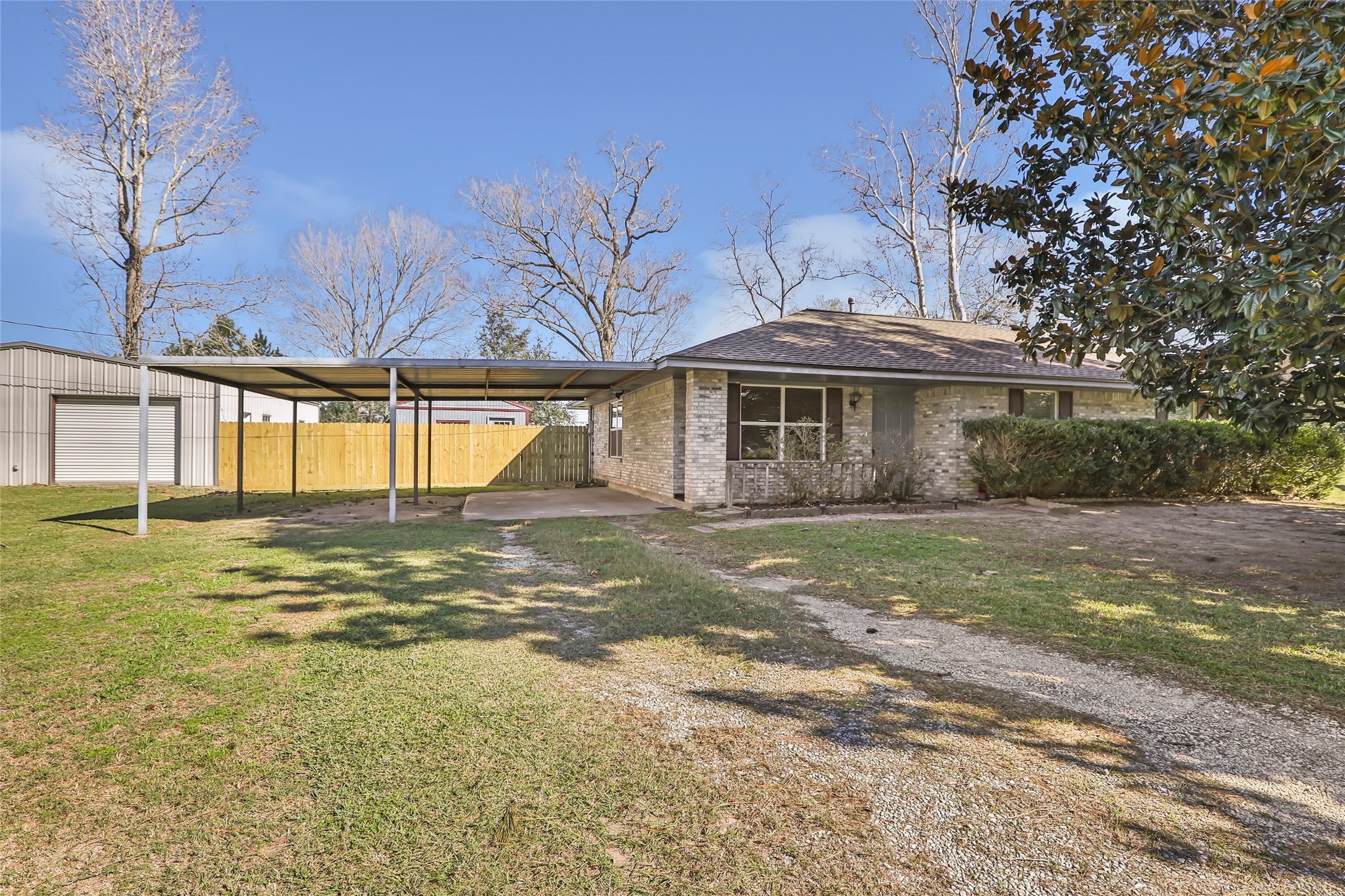 4019 Hillcrest Street Liberty, TX 77575 - Photo 30 of 31 a view of a house with a yard