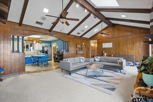 a kitchen with cabinets appliances and a counter top space