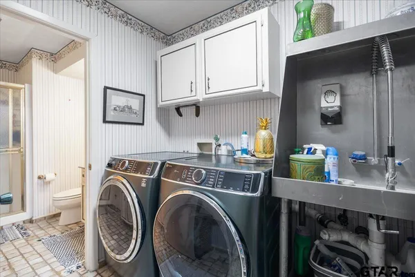 a swimming pool with outdoor seating and yard