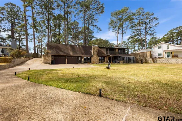 a view of swimming pool with outdoor seating