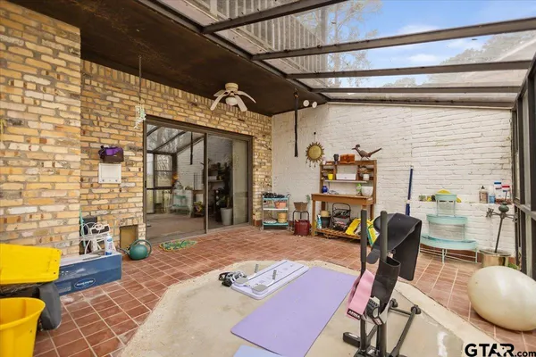 a bathroom with a sink a mirror and a shower