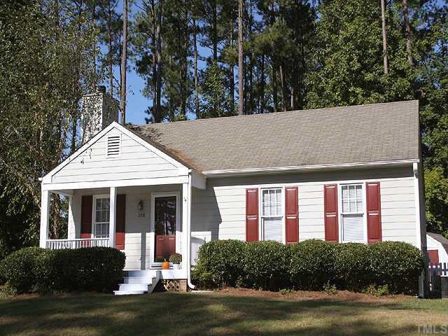 208 Cross Pines Drive Raleigh, NC 27603 - Photo 1 of 1 a house view with a garden space