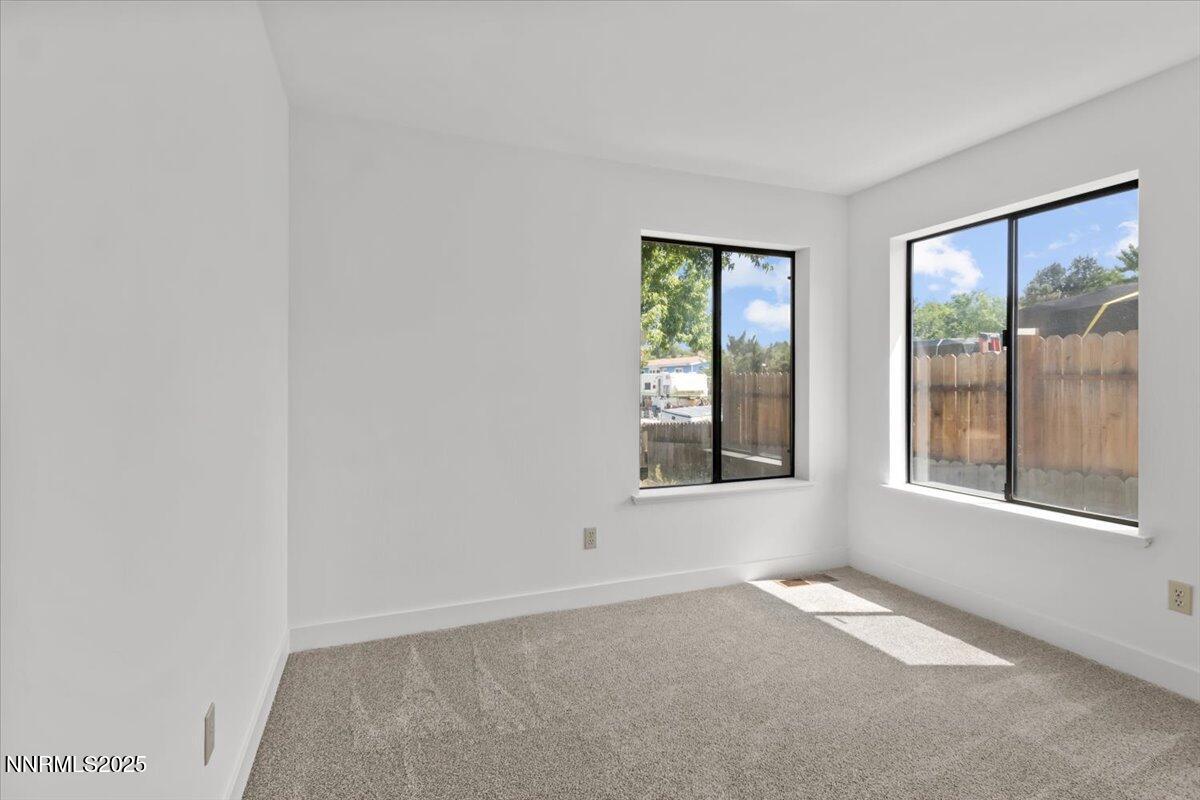4830 Rampion Way Sun Valley, NV 89433 - Photo 13 of 30 an empty room with a window