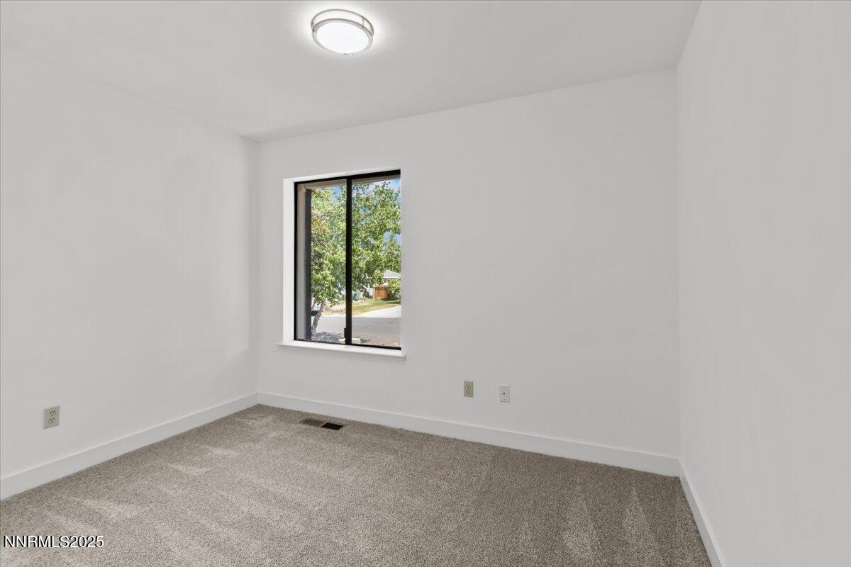 4830 Rampion Way Sun Valley, NV 89433 - Photo 15 of 30 an empty room with a window