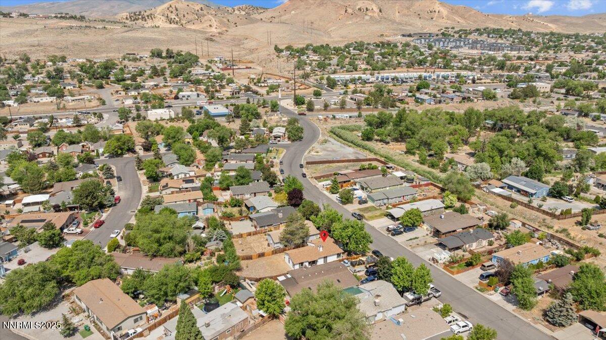 4830 Rampion Way Sun Valley, NV 89433 - Photo 28 of 30 an aerial view of residential houses with outdoor space