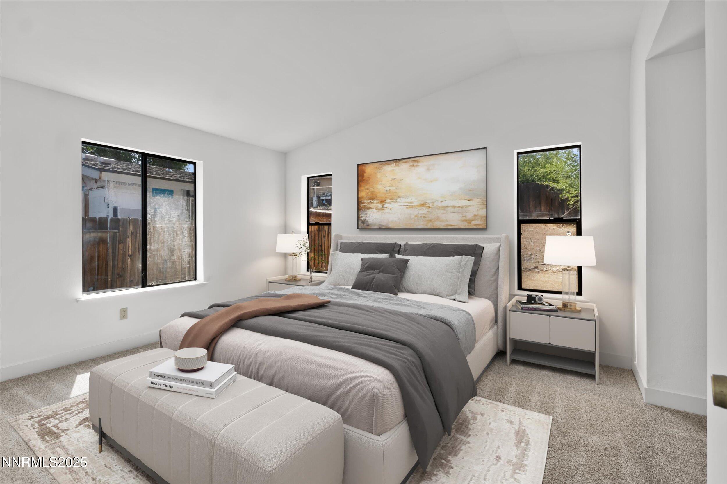 4830 Rampion Way Sun Valley, NV 89433 - Photo 3 of 30 a bedroom with a bed and a window