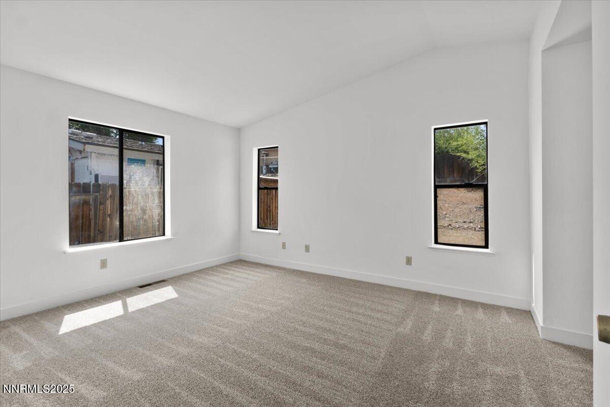 4830 Rampion Way Sun Valley, NV 89433 - Photo 10 of 30 an empty room with windows