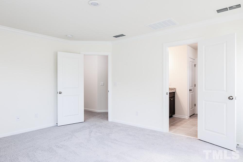 6940 Leesville Road, Unit 10 Raleigh, NC 27613 - Photo 27 of 38 a view of an empty room