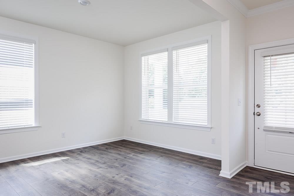 6940 Leesville Road, Unit 10 Raleigh, NC 27613 - Photo 32 of 38 an empty room with a window