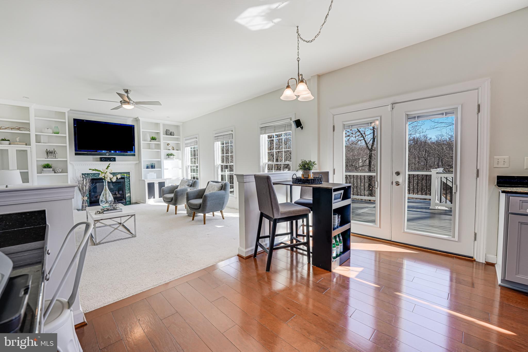 17583 Summer Duck Drive Dumfries, VA 22026 - Photo 15 of 49 a view of a dining room with furniture window and wooden floor