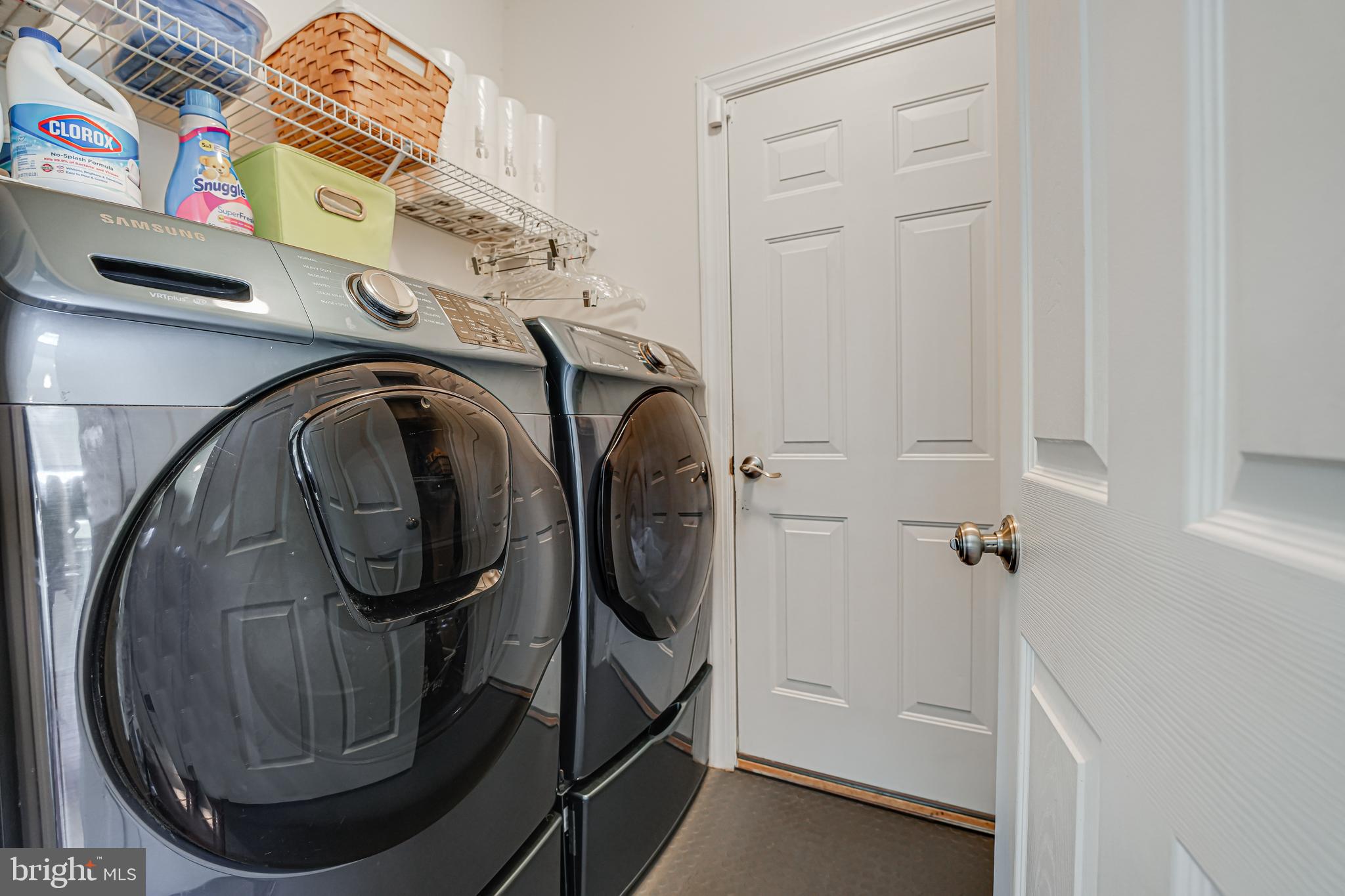 17583 Summer Duck Drive Dumfries, VA 22026 - Photo 19 of 49 a utility room with dryer and washer