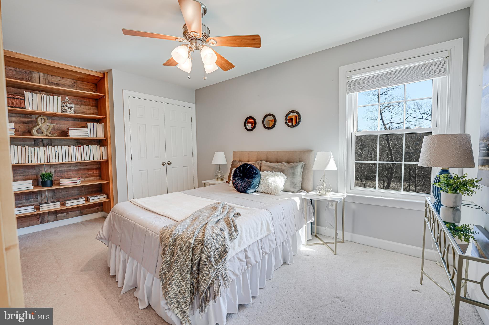 17583 Summer Duck Drive Dumfries, VA 22026 - Photo 26 of 49 a bedroom with a bed and a chandelier
