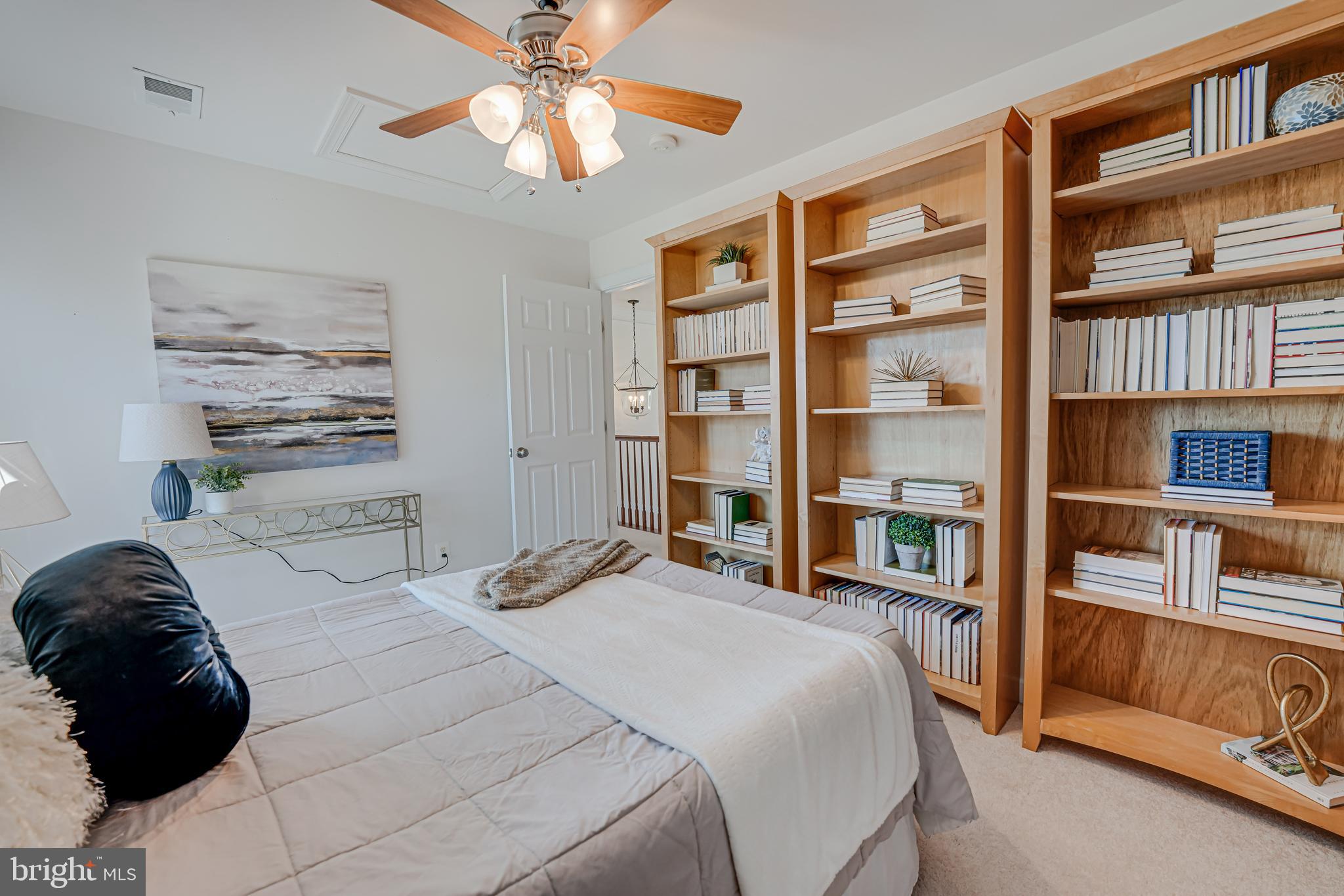 17583 Summer Duck Drive Dumfries, VA 22026 - Photo 27 of 49 a bedroom with a bed and a cabinets