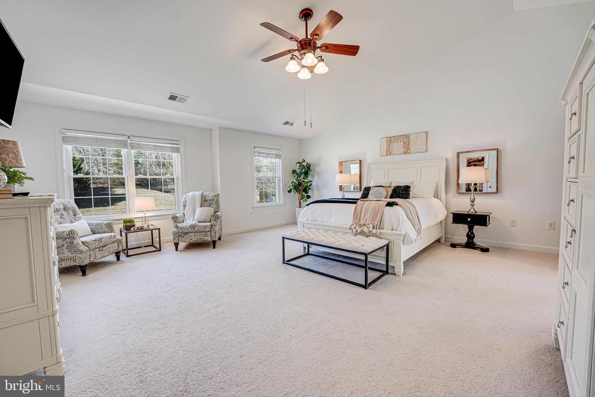 17583 Summer Duck Drive Dumfries, VA 22026 - Photo 28 of 49 a living room with furniture and a chandelier