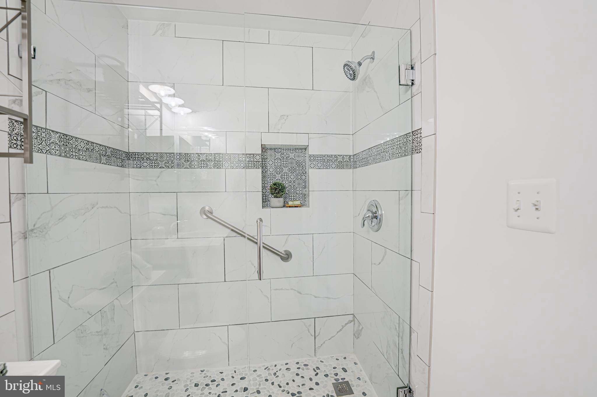 17583 Summer Duck Drive Dumfries, VA 22026 - Photo 41 of 49 a bathroom with a shower