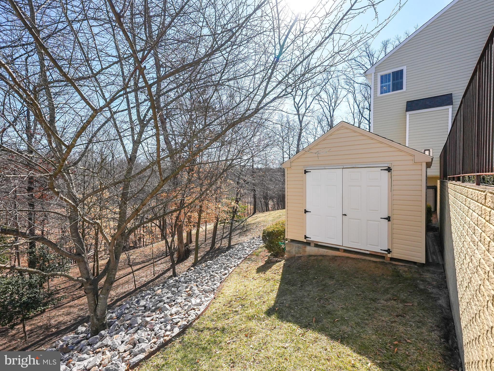 17583 Summer Duck Drive Dumfries, VA 22026 - Photo 45 of 49 a front view of a house with a yard