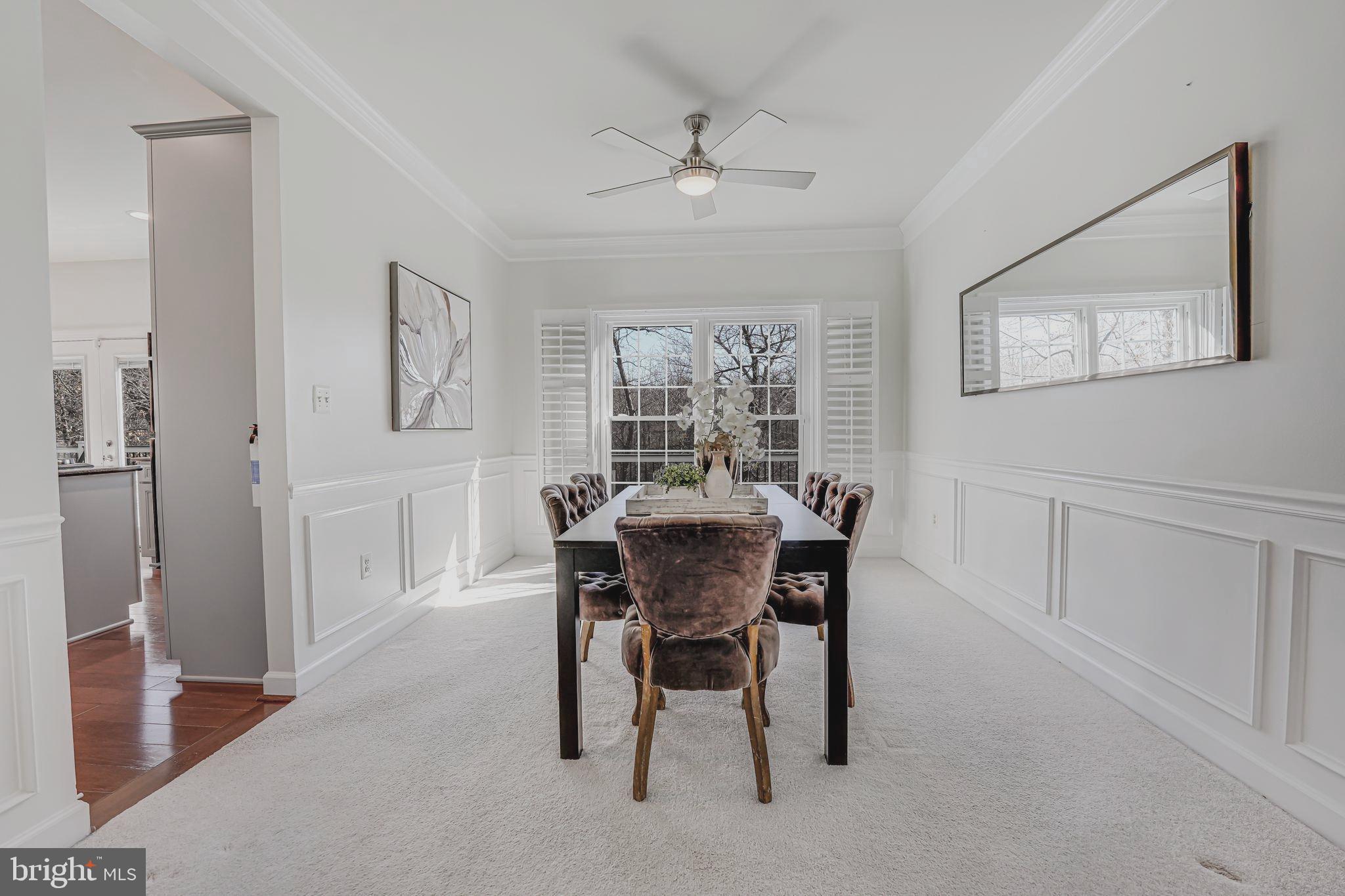17583 Summer Duck Drive Dumfries, VA 22026 - Photo 10 of 49 a view of a dining room with furniture and window