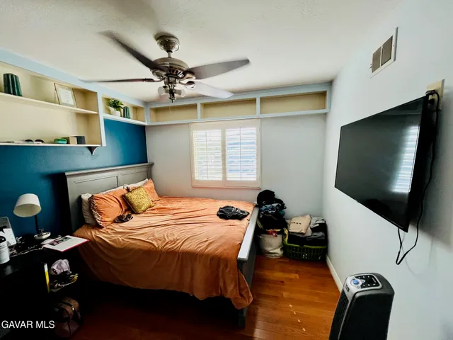 a kitchen with a sink and a refrigerator