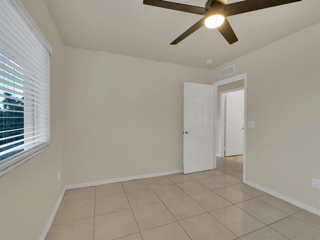 308 Northwest 17th Terrace Pompano Beach, FL 33069 - Photo 12 of 43 a view of an empty room