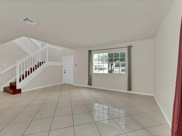 a view of an entryway with white walls