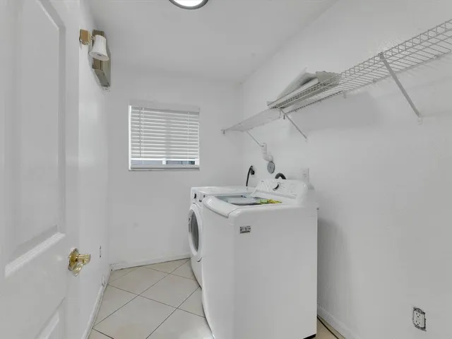 a utility room with a washer and dryer