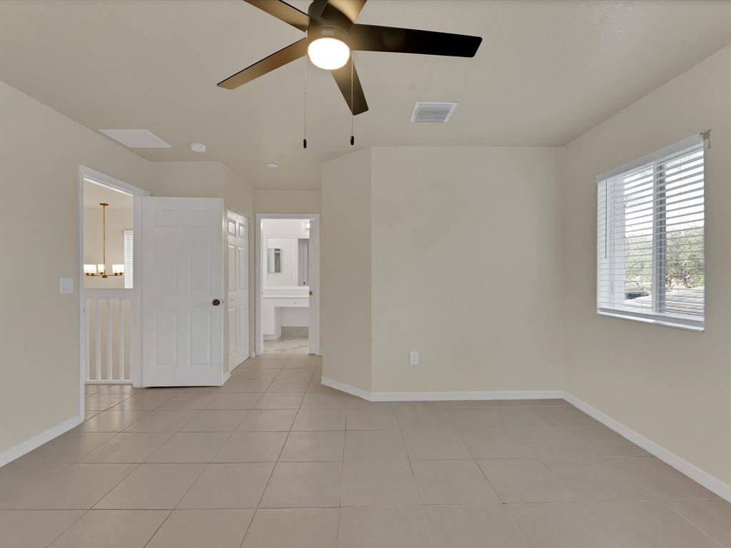 308 Northwest 17th Terrace Pompano Beach, FL 33069 - Photo 4 of 43 a view of an empty room with a window