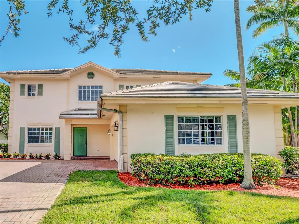 308 Northwest 17th Terrace Pompano Beach, FL 33069 - Photo 41 of 43 front view of a house with a yard