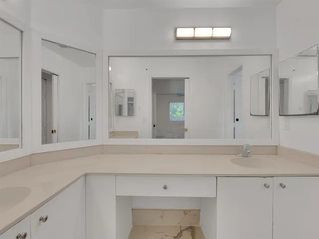 a sink with a mirror