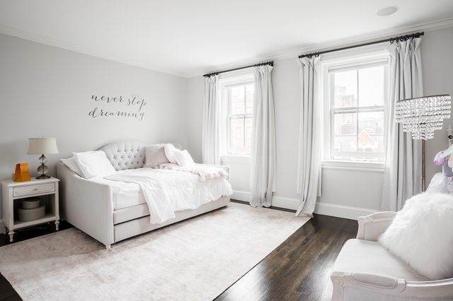 a room with a bed and a window