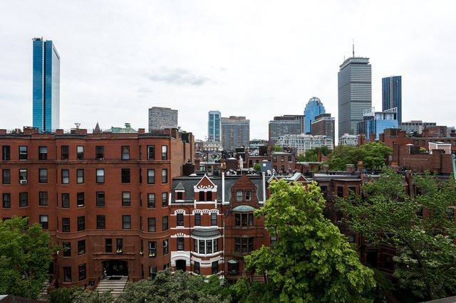 a view of a city with tall buildings