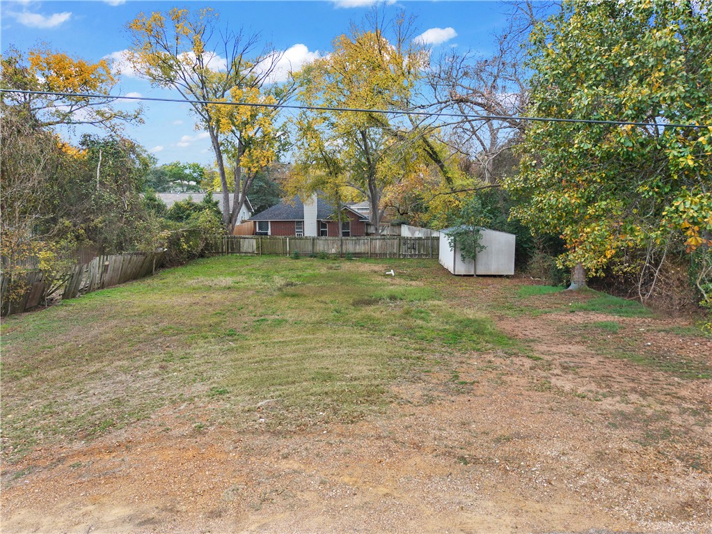 1013 East 26th Street Bryan, TX 77803 - Photo 2 of 8 a view of a field with trees