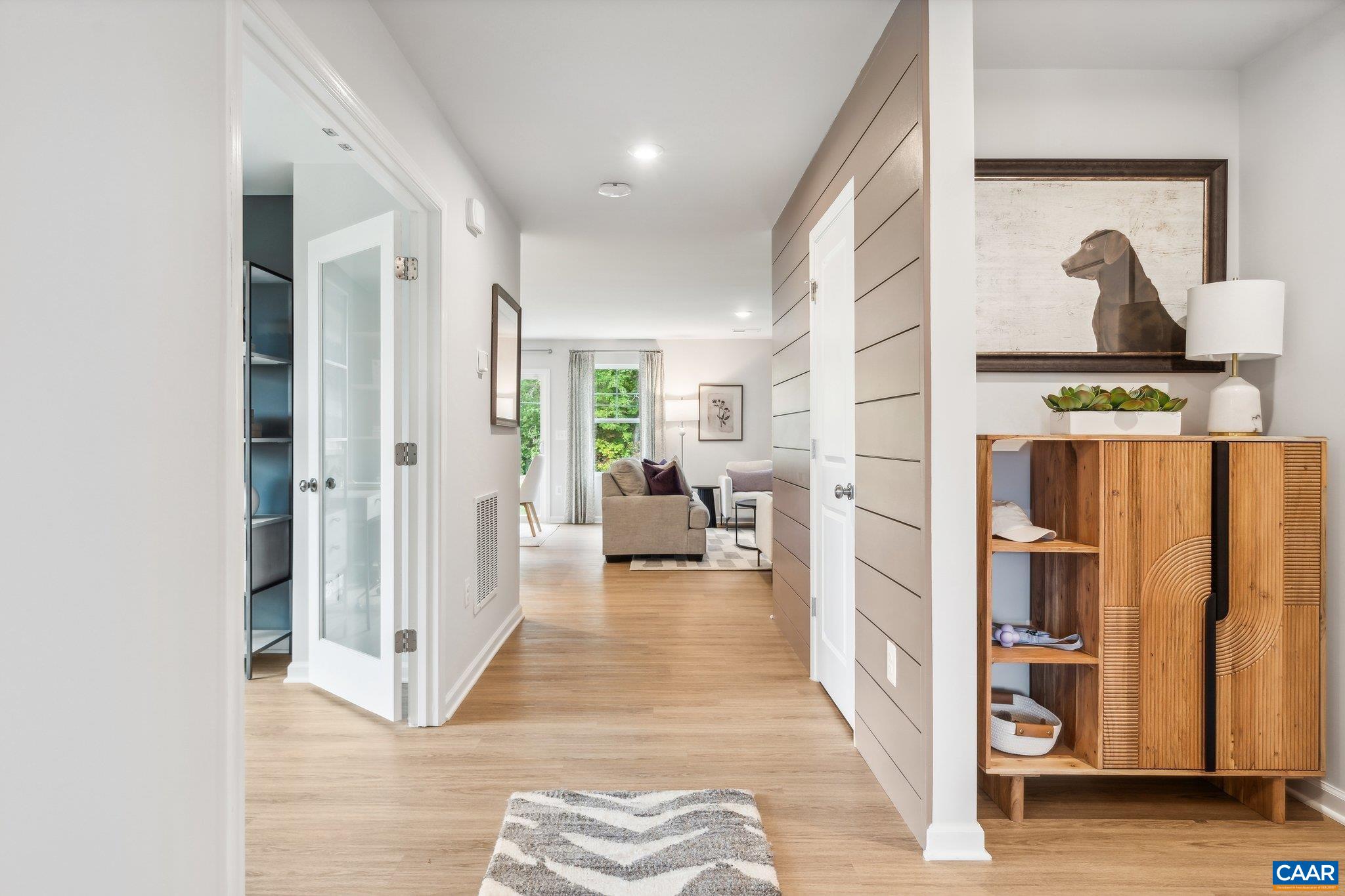 247 Trailfork Road Barboursville, VA 22923 - Photo 9 of 40 a living room with furniture and a painting on the wall
