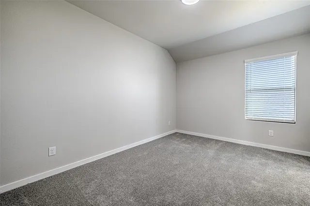 a view of storage and utility room with closet
