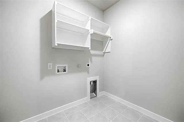 a kitchen with a sink dishwasher a stove and a refrigerator with wooden floor