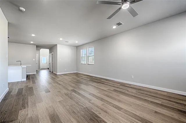 an empty room with closet area