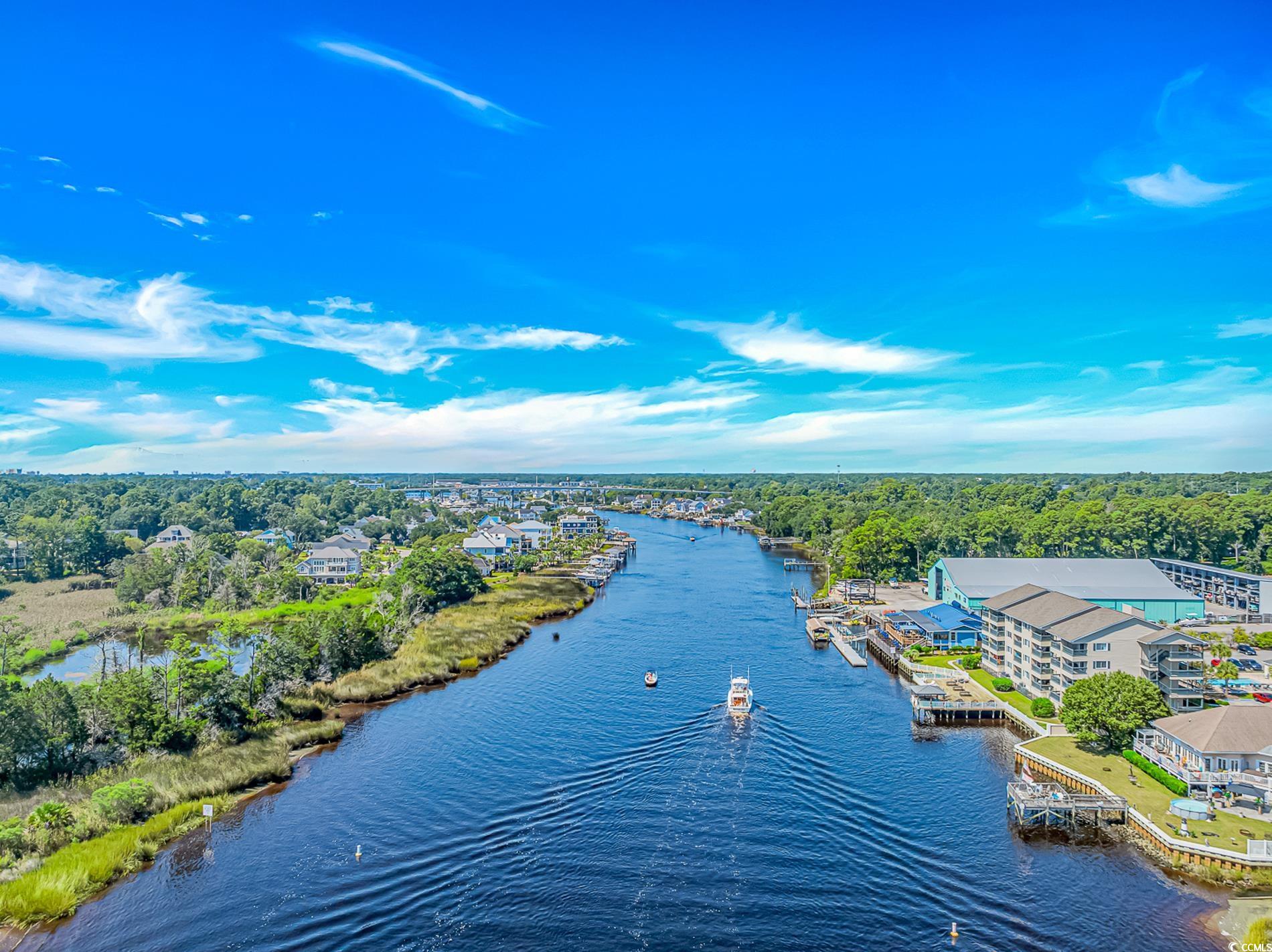 4383 River Road Little River, SC 29566 - Photo 39 of 40 Drone / aerial view of a large body of water