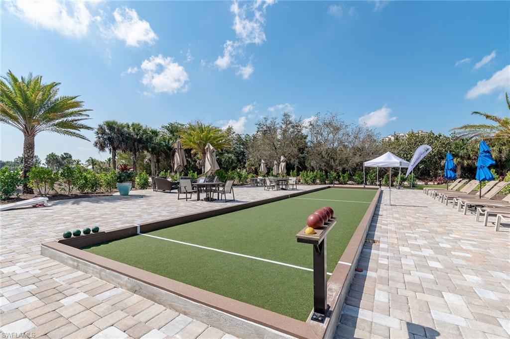1286 Rialto Way, Unit 9202 Naples, FL 34114 - Photo 39 of 49 Surrounding community with a bocce ball area and a patio area