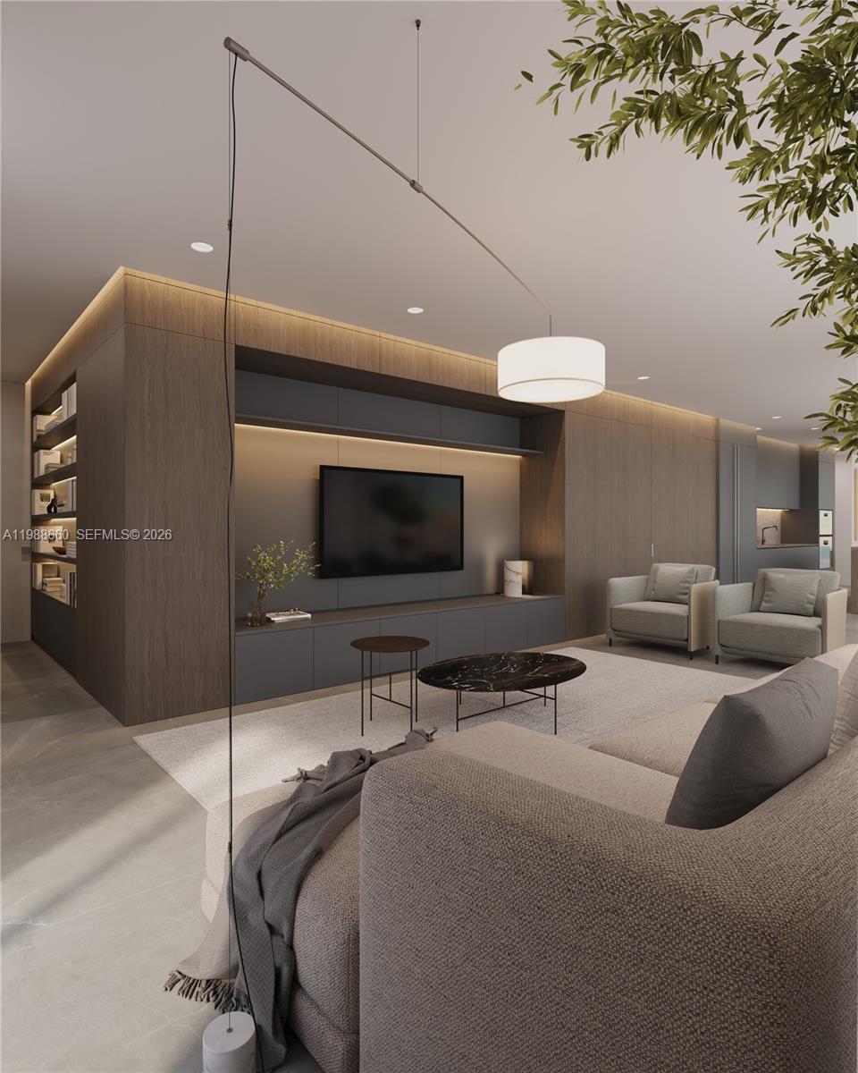 829 4th Street, Unit 2 Miami Beach, FL 33139 - Photo 14 of 27 a living room with furniture and a flat screen tv