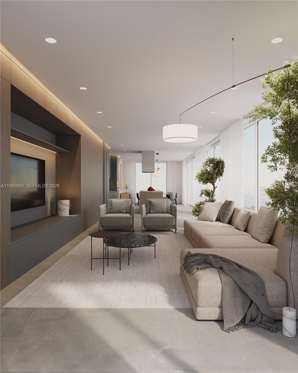 829 4th Street, Unit 2 Miami Beach, FL 33139 - Photo 15 of 27 a living room with furniture and a couch