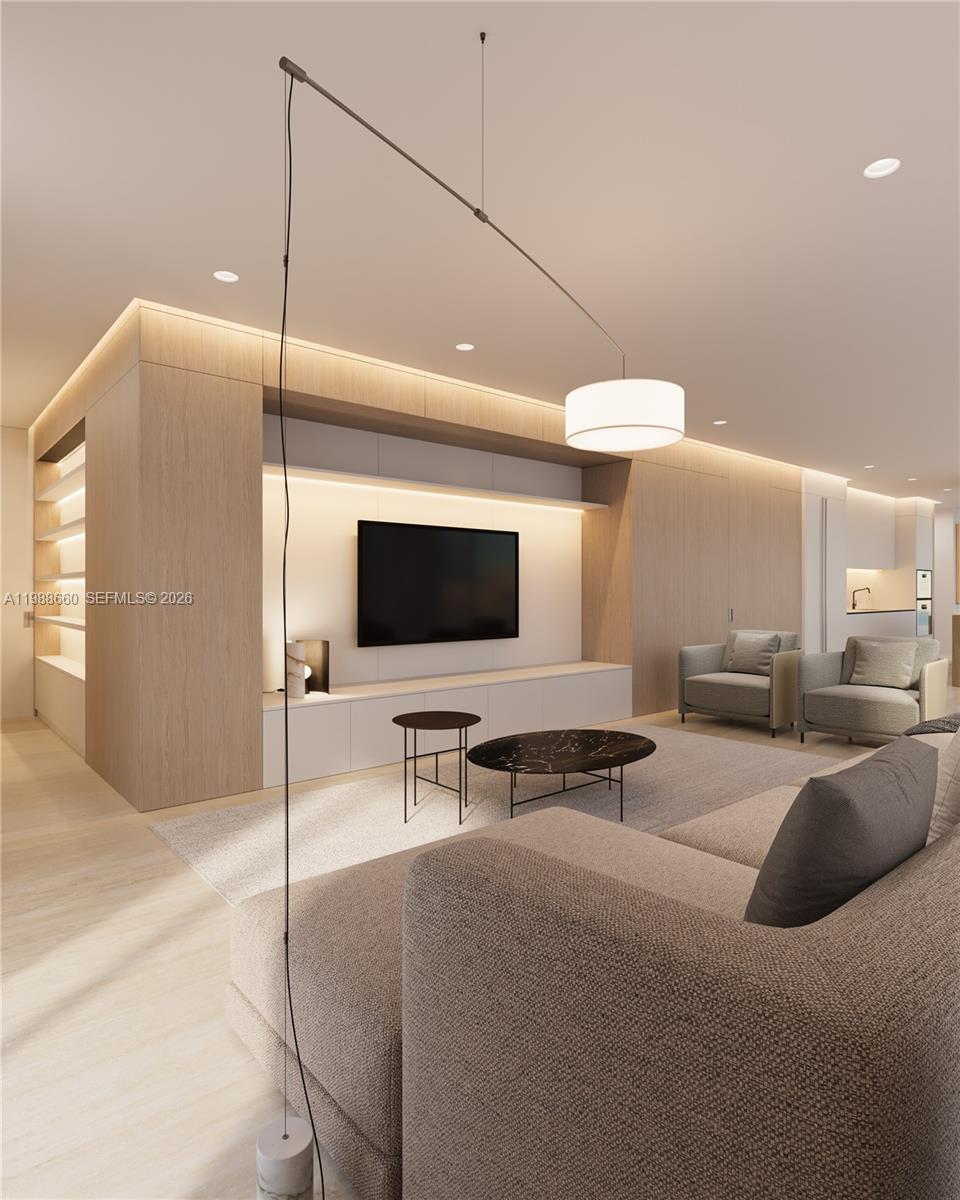 829 4th Street, Unit 2 Miami Beach, FL 33139 - Photo 21 of 27 a living room with furniture and a flat screen tv