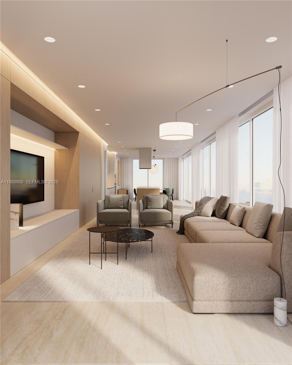 829 4th Street, Unit 2 Miami Beach, FL 33139 - Photo 22 of 27 a living room with furniture and a flat screen tv